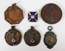 A selection medals, one silver