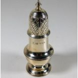 A silver pepper pot Spink & Son London 1963, 4.5in