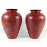 A pair of Chinese vases with relief decor 10.25in