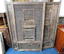 An antique Moroccan style three piece screen, some