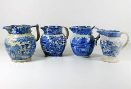 Four blue & white jugs including Worcester style j