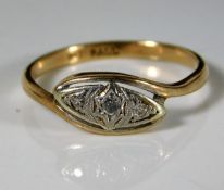 A 9ct gold ring set with three small diamonds 1.7g