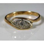 A 9ct gold ring set with three small diamonds 1.7g