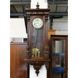 A 19thC. mahogany Vienna clock 54in H