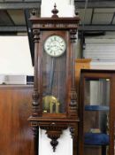 A 19thC. mahogany Vienna clock 54in H