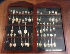 Two cases of collectors spoons including two silver