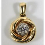 A 9ct gold pendant set with approx. 0.2ct diamond