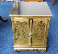 An Oriental lacquerware cabinet with gilded decor