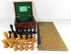 A 19thC. Staunton loaded chess set with box & Chad Valley chess board, king 4in tall, some pieces a/