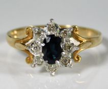 A 9ct gold ring set with diamond & sapphire 2.2g s
