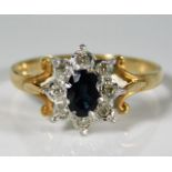 A 9ct gold ring set with diamond & sapphire 2.2g s