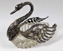A swan ornament with silver fittings 3.75in H