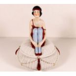 An art deco porcelain figurative pot & cover 9in H