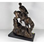 A bronze resin style model of horse & rider on pli