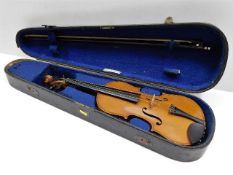 An antique violin in a G. Withers & Co. case