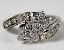 A white metal ring set with approx. 1ct diamond 4.