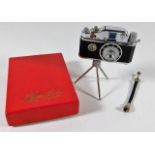 A boxed novelty camera lighter 3.5in H
