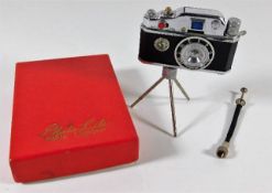 A boxed novelty camera lighter 3.5in H