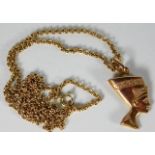 A 9ct gold chain with 9ct gold Egyptian style bust