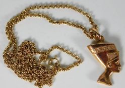 A 9ct gold chain with 9ct gold Egyptian style bust