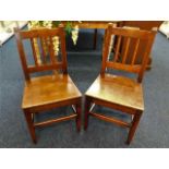 A pair of 19thC. oak hall chairs