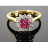 An 18ct gold ring set with 0.37ct diamond & ruby 2