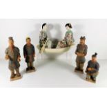 Four Chinese earthenware figures twinned with a fi