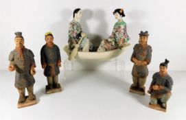 Four Chinese earthenware figures twinned with a fi