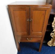 An open backed mahogany entertainments cabinet with drawer under