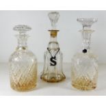 Two Stuart cut glass decanters & one other, talles