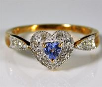 A 9ct gold ring with heart shaped crown set with 0