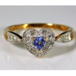 A 9ct gold ring with heart shaped crown set with 0