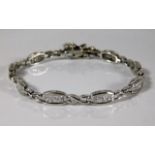 A 9ct white gold bracelet set with approx. 2ct dia