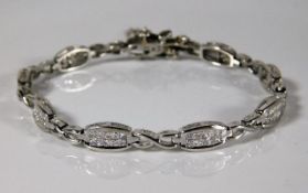 A 9ct white gold bracelet set with approx. 2ct dia