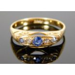 An antique 18ct gold ring set with diamond & sapph