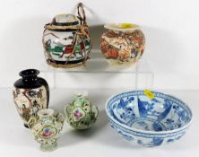 Six Oriental pieces of porcelain including a ginge