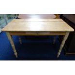 A small antique pine farmhouse table with drawer 4