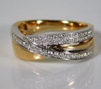 A 14ct two colour gold ring set with approx. 0.36c