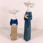 Two Lladro nun figurines, tallest 10.5in