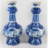 A pair of hand decorated 19thC. Chinese style blue