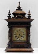 A decorative late Victorian walnut mantle clock 22