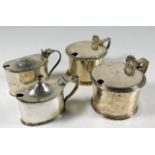 Four silver condiment pots, two without liners, si