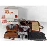 Four vintage cameras including Mercury II Universal & accessories
