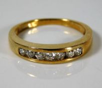 An 18ct gold ring set with approx. 0.28ct diamonds