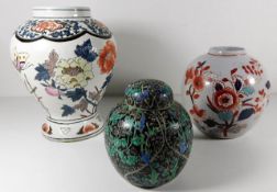 A Chinese porcelain vase twinned with two Chinese