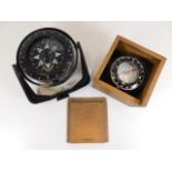 Two nautical boat compasses