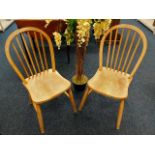 A pair of elm & beech kitchen chairs