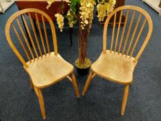 A pair of elm & beech kitchen chairs