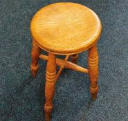 An antique elm farmhouse stool 21in H