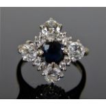 An 18ct white gold ring set with sapphire & approx